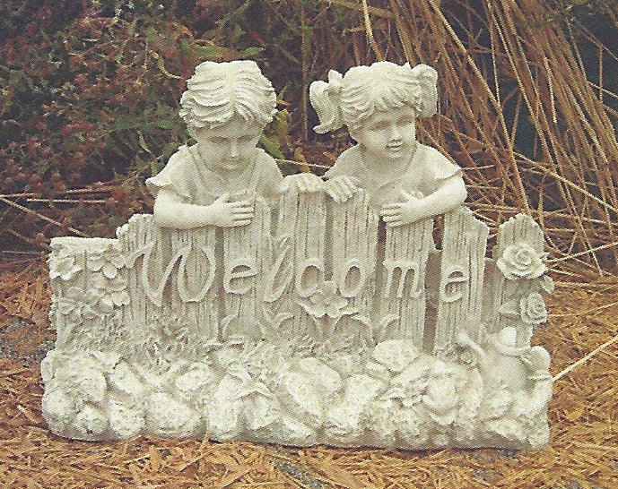 Photo of Boy and Girl Leaning on Fence - Marquis Gardens