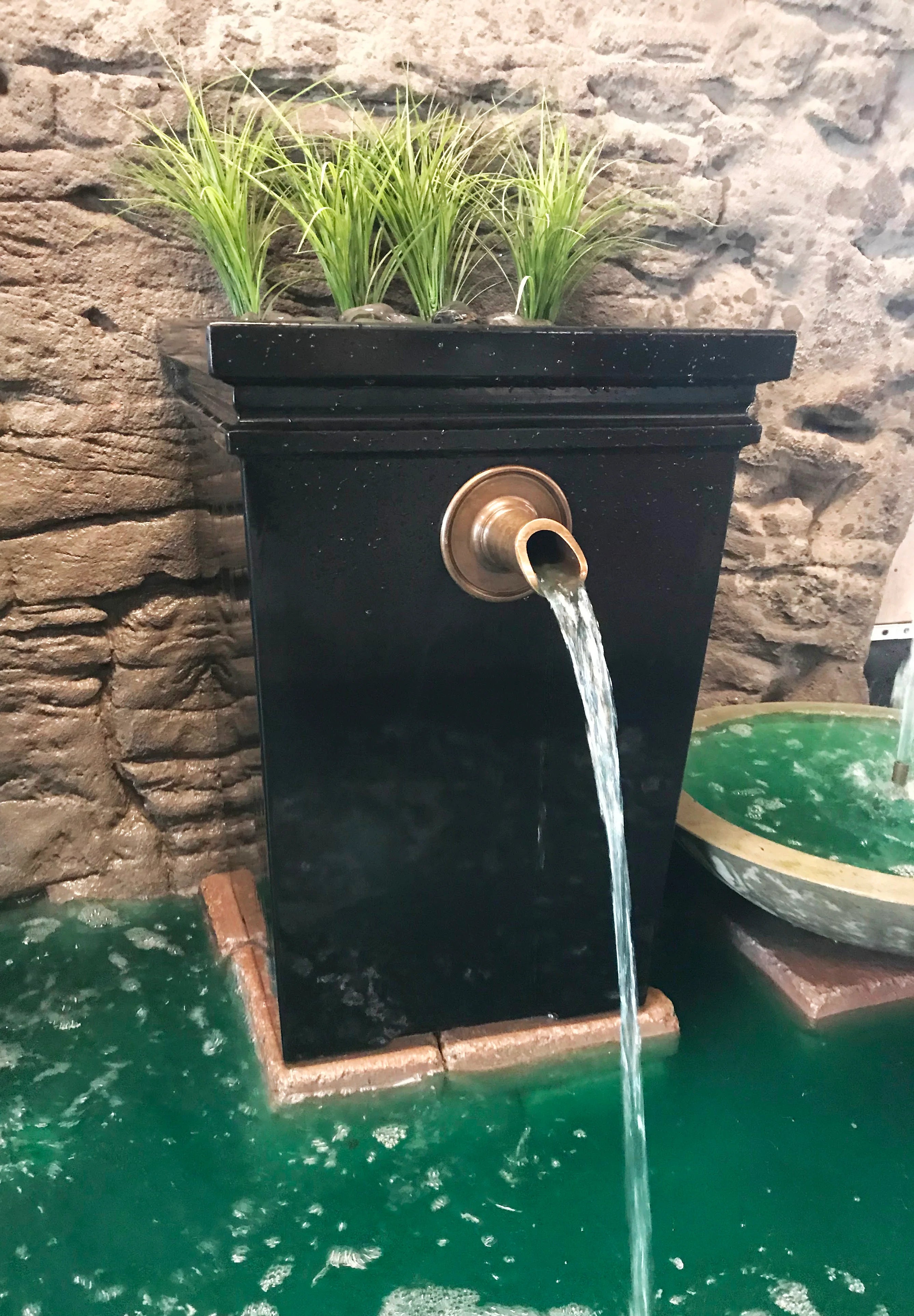 Photo of Round Wall Brass Scupper - Marquis Gardens