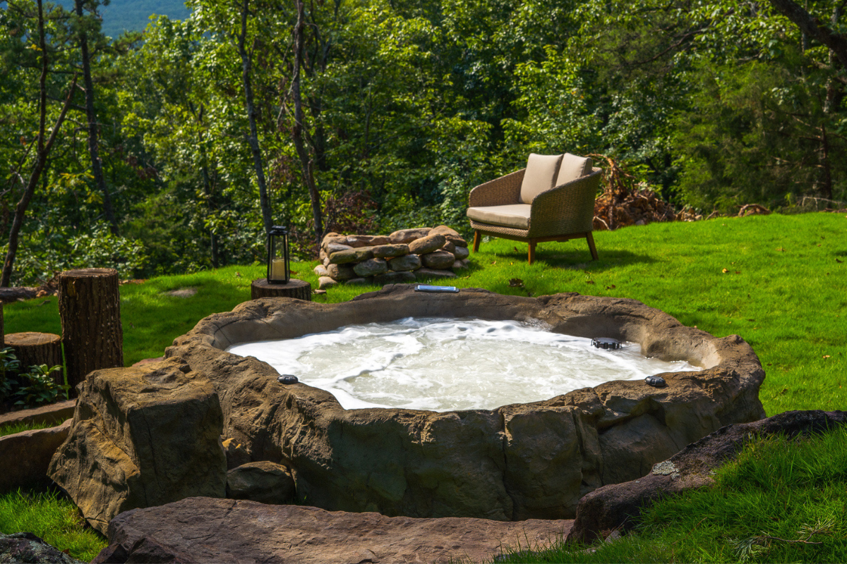Photo of Universal Rocks Semi In-Ground Spa - Earth - Marquis Gardens